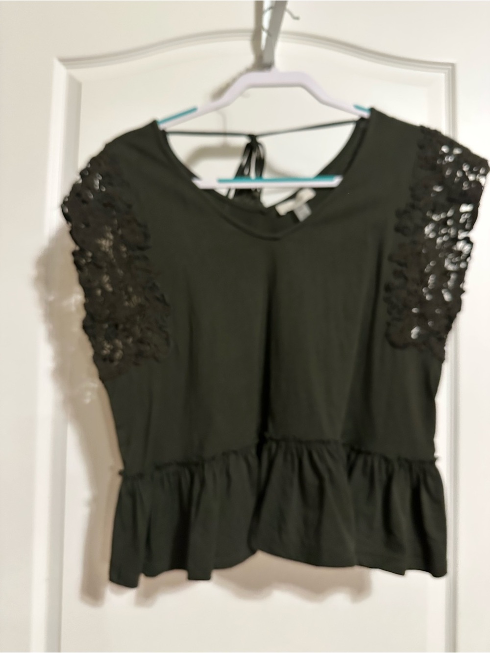 Cupio Black Peplum Top with Lace Cap Sleeves